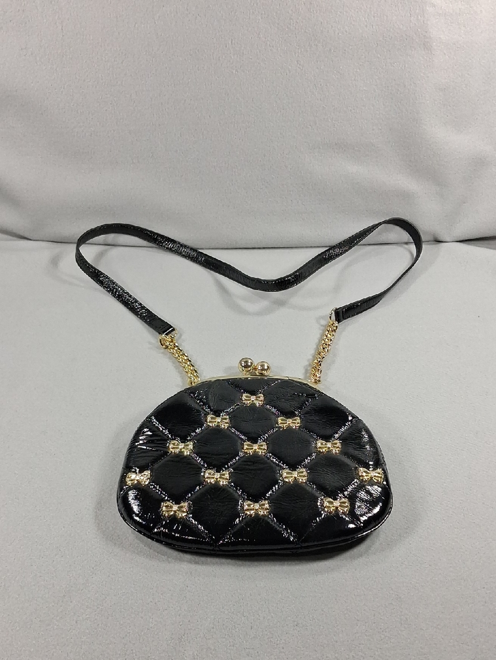 Black Quilted Crossbody Bag with Gold Accents